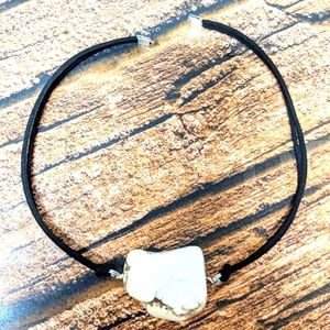 White stone & Black leather